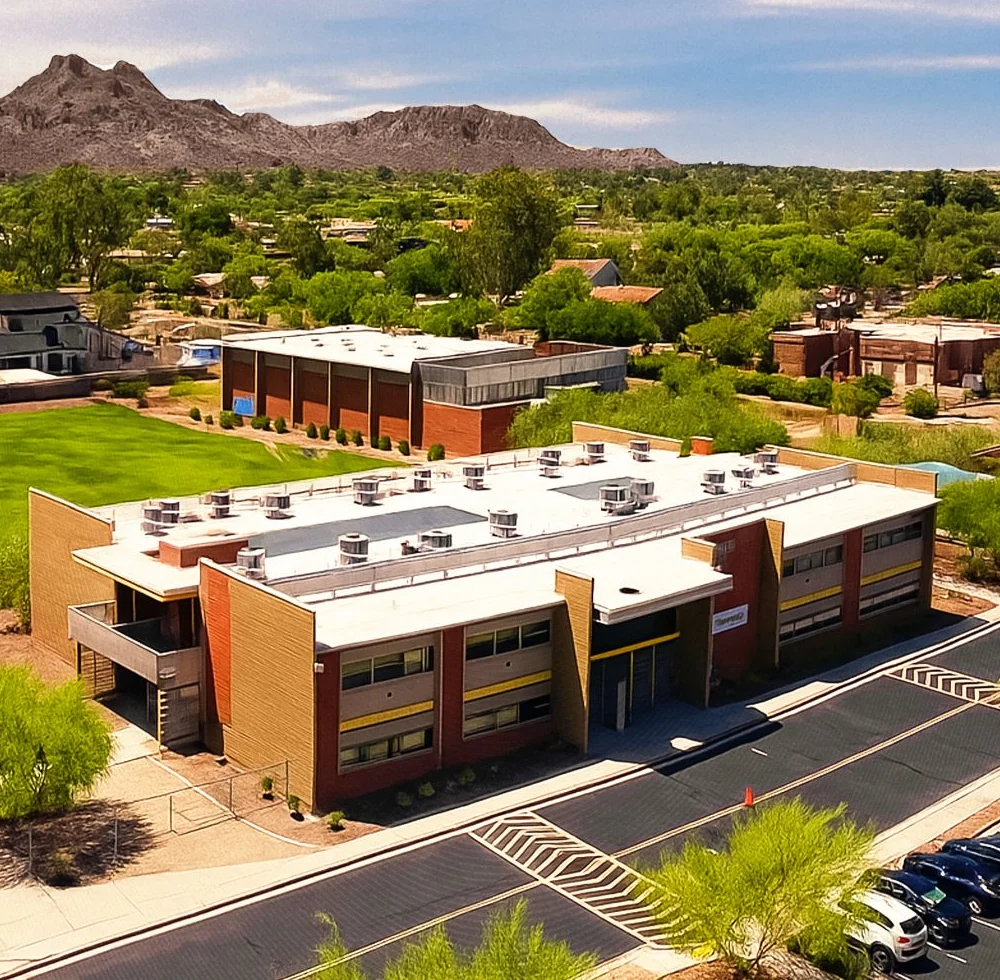 Aerial view of the Gateway Academy campus and athletic field at the base of the Phoenix Mountain Preserve