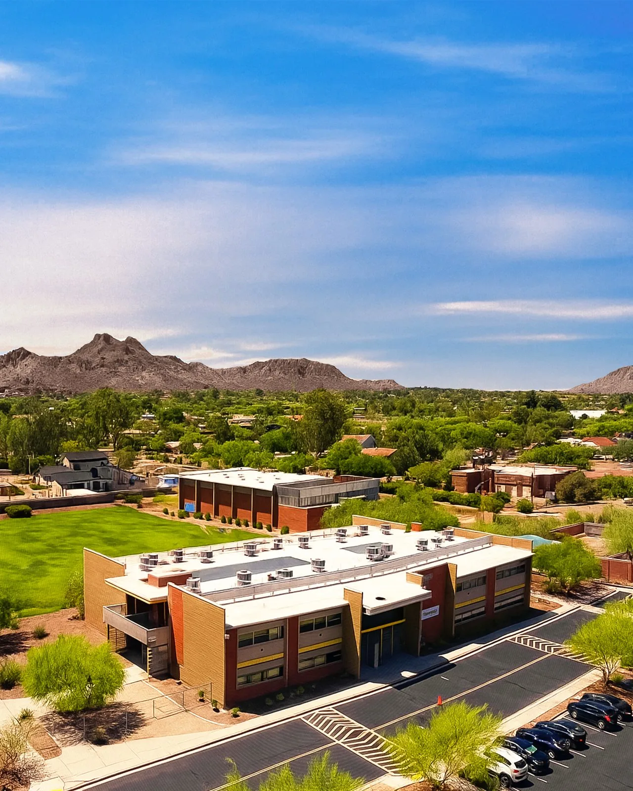 Aerial of the Gateway Academy campus and athletic field at the base of the Phoenix Mountain Preserve